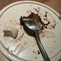 Chocolate torte with peanut butter nice cream  at SACRO in Buenos Aires