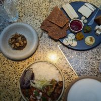 Thai curry rojo, alcaucil, y plato de queso at SACRO in Buenos Aires