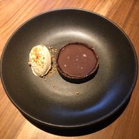 Chocolate tart with salted caramel and peanut ice cream at SACRO in Buenos Aires