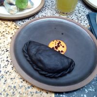 Empanada de carbón activado at SACRO in Buenos Aires