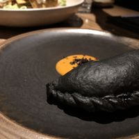 Carbón activado, empanada exquisita!   at SACRO in Buenos Aires