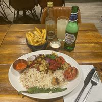 Having the most amazing delicious🤤vegan🌱mixed grill, rice, pineapple and fries as starter and main course around West London..  at Vegology in West London