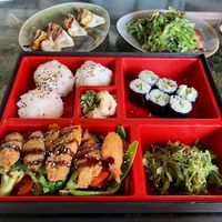 bento box, semi-warm dumplings, seaweed salad...  at Secret Garden in Berlin