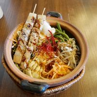 Bamboo Forrest (udon noodles with bamboo sprouts, sesame, princess beans, yakitori skewers, green tea sauce) at Secret Garden in Berlin