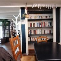 Cozy seating area in the back at Le Petit Colibri in Lyon