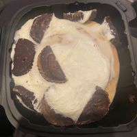 DIY roll with cream cheese frosting and Peanut Butter Cups  at Cinnaholic in Seattle