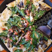 Truffle pizza was yummy addictive 😋 at Mooses Tooth in Anchorage