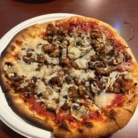 Mini vegan pizza with tempeh & mushrooms  at Blue Highway Pizza in Micanopy