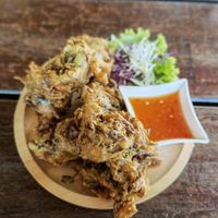 Deep fried veggie fritters that were crunchy and filling at the same time.
A very generous portion as well.

Served with sweet Thai chilli dip.

Slide for menu.  #Veganuary at Benny's On The Beach in Koh Lipe