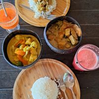 Red (right bowl) + green curry at Benny's On The Beach in Koh Lipe