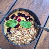 Mango smoothie bowl at Benny's On The Beach in Koh Lipe