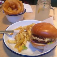 Vegan burger, chips and onion rings with lemonade at Honest Burgers in London