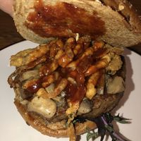 FORAGER (V)
impossible™burger§ , truffle frizzled onions, organic wild mushrooms, organic baby kale, smoke sauce, sprout bun
 at Bareburger in Plainview