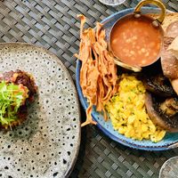 The full breakfast next to the corn fritters at Redemption - Seven Dials in London