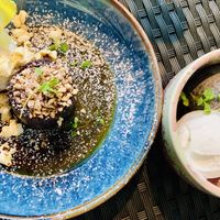 Sticky toffee pudding next to a trio of ice creams  at Redemption - Seven Dials in London