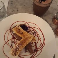 Banoffee pie with "love handles chocolate" hot drink (coconut, cacao and vanilla) at Redemption - Seven Dials in London