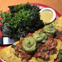 Besan chilla and tender sautéed kale with delicious curry sauce! at Duluth Grill in Duluth