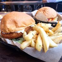 Schnitzel (front) and cheeseburger (back) at MURDEReats in Leichhardt