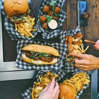 Burgers/long roll/fries at MURDEReats in Leichhardt