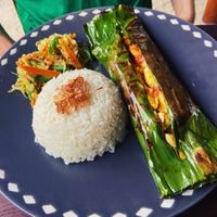 Tofu cooked in banana leaf with Balinese spices, rice and veg  at Clasico in Lembongan