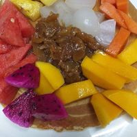 Fruit pancake with coconut and palm sugar syrup. Very good stuff. at Bar Ang in Battambang