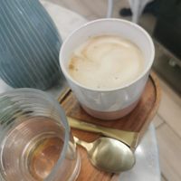 Oat milk cappucino at Omas Backstube in Vienna
