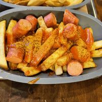 Curry sausage and fries  at Frittenwerk - Ehrenstraße in Cologne