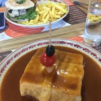 Vegan francesinha (and vegan burger in the background)! Very tasty  traditional dish😋 at Santa Francesinha in Porto