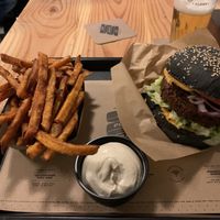 Sweet potato fries + veganaise + Vincent Vegan Burger + draft beer at The Potato Bar  in Bruges