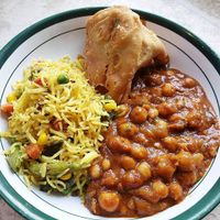 Chana masala, pulao rice, and samosa at Kirtida Kitchen in Guelph