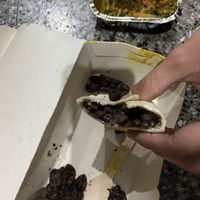 This is what they call “bean fajita”. Self note: always open the take away boxes before leaving restaurants to check what you are being served.  at Kormasutra in Cusco