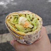 Vegan wrap with Hummus, Eggplant, Iceberg salad, Coleslaw, Tofu at Juice and Food in Catania