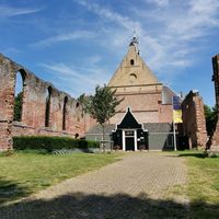 Old ruined church opposite with pleasant carillon
 at ECHT in Bergen