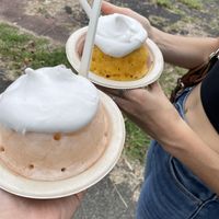 Soursop shave ice with haupia (left) and lilikoi/strawberry shave ice with haupia (right)  at Kula Shave Ice in Hilo
