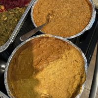 Red lentil curry and the other is have yellow lentil curry and chickpea flour stew  at Teff N' Greens in Calgary