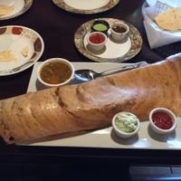 This is the Spinach Dosa. It appeared huge on first glance, but the crepe is very thin and light. The inside was about 3/4 filled with spinach. at Taste of India in Melbourne