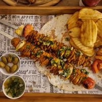 Chicken skewer at Hummus Bar in Haifa