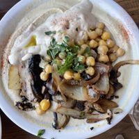 Hummus with mushrooms at Hummus Bar in Haifa