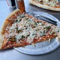 Vegan pizza with jalapeños, basil, and garlic  at Lazy Moon Pizza - Colonial Dr in Orlando
