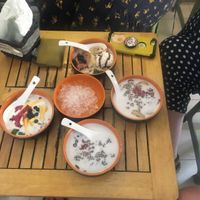 Yogurt with jackfruit, red beans, caramel mixed bowl with ice cream, sweet banana at Little Bowl in Hanoi