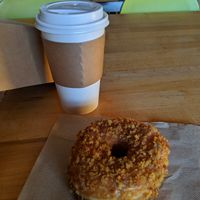Pumpkin crumb and a chai latte. They have alternative milk choices for their coffee, for an upcharge at Holey Schmidt Donuts in Reno