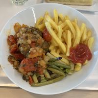 Veggie-balls menu is vegan is you ask for fries instead of mashed potatoes. Apple cake in the background. at IKEA in Lyssach