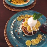 Pancakes made vegan (swap the curd for coconut ice cream) and tofu scramble wrap. at Cafe Kumbuk in Colombo