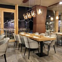 The restaurant has unusual lighting at CampZero in Ayas