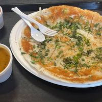 Onion chili uttapam   at Shreeji Indian Vegetarian Street Food in Louisville