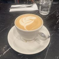 Oat flat white    at LHR - Giraffe - T3 in West London