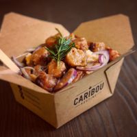 Veganuary special- linda McCartney sausages with onions and deep fried rosemary at Caribou Poutine in Liverpool
