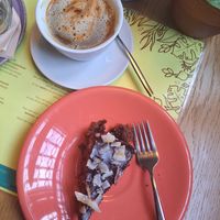 Cacao cake with cappuccino at Semente - Art - Coffee & Plant Based Food in Braga