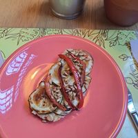 Humous, courgette, pepper and seed toast at Semente - Art - Coffee & Plant Based Food in Braga