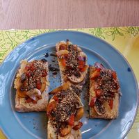 Brushettas houmous-mushrooms-red pepers at Semente - Art - Coffee & Plant Based Food in Braga